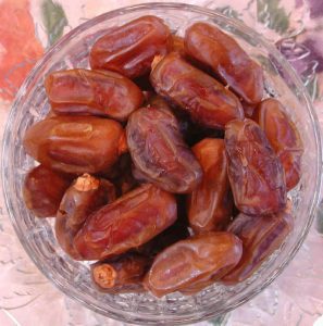 hallawi dates in a transparent bowl