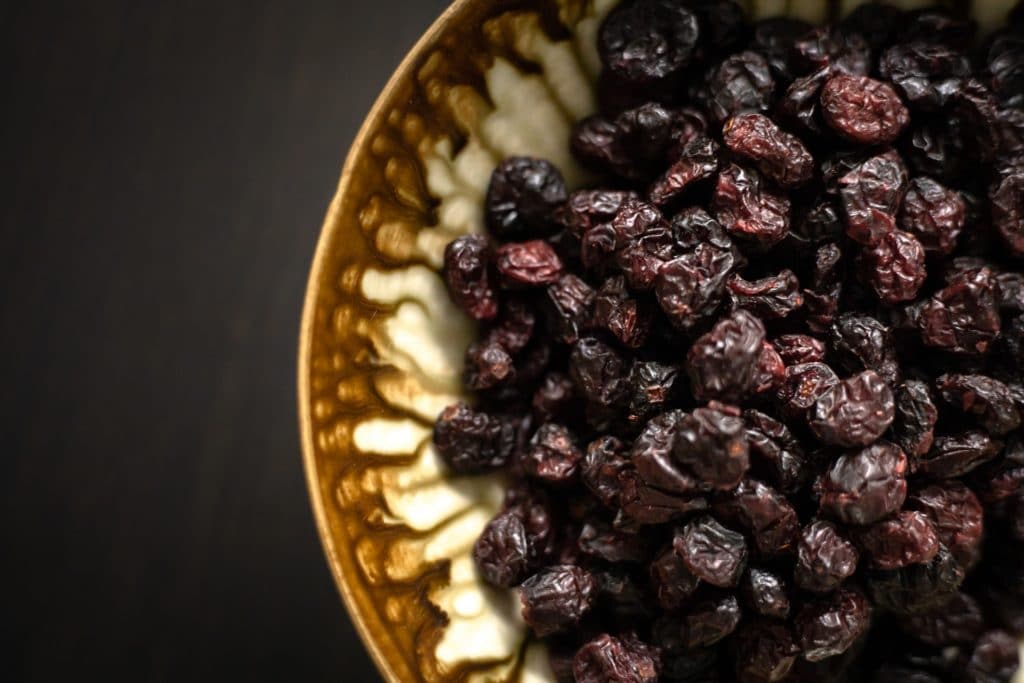 dry raisins kept in a beautiful bowl