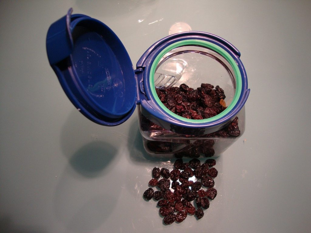 black raisin in a transparent jar