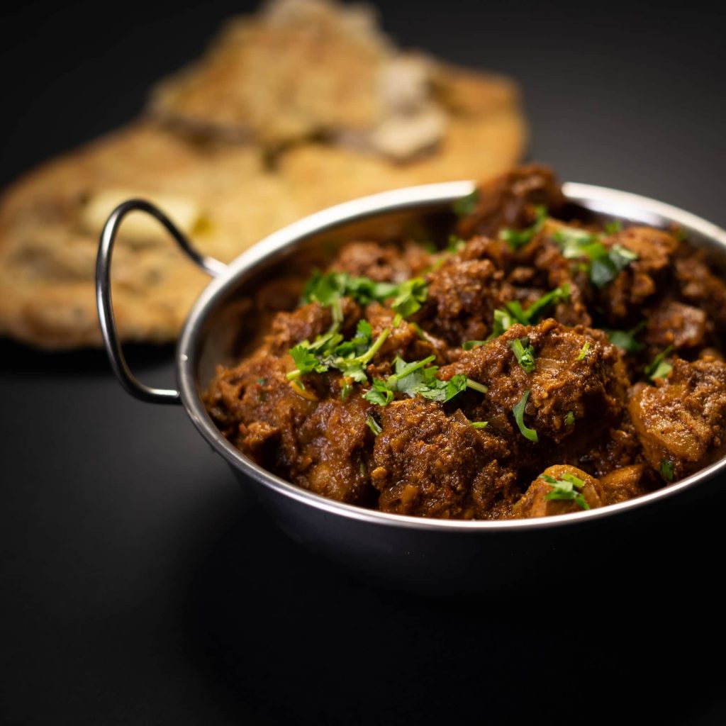 kasuri methi topped on indian vegetable curry