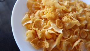 corn flakes served in a white bowl