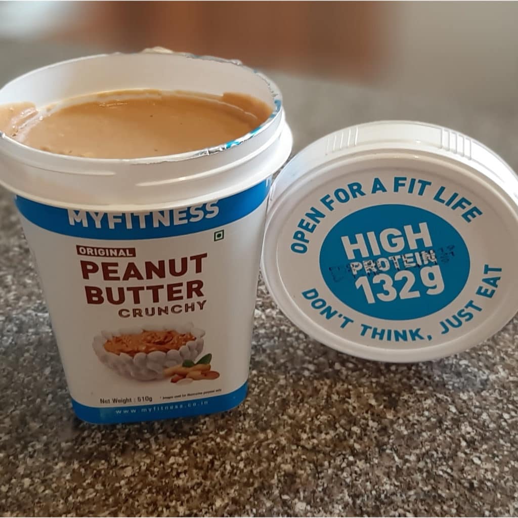 peanut butter visible from the top of its container