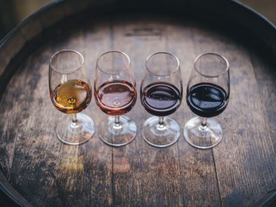 4 glasses of wine in colorful flavors