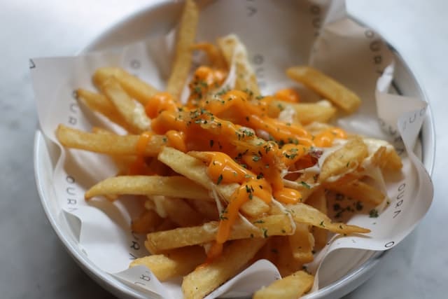 crispy french fries with fresh spicy herbed mayonnaise.
