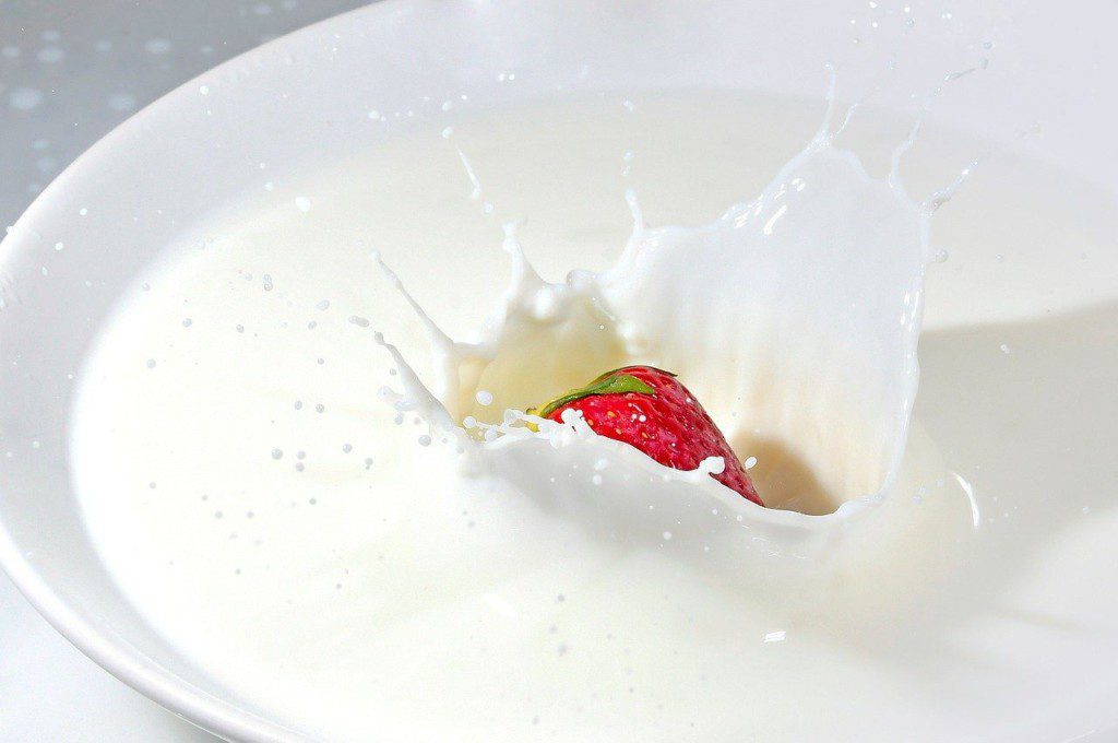 milk in a bowl with strawberry