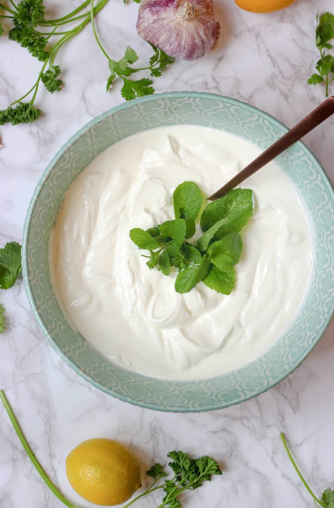 curd served with mint leaves