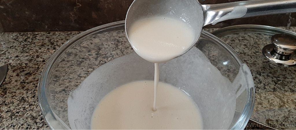 batter of instant mix in transparent glass bowl