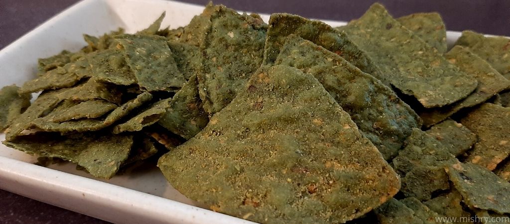 closer look at cornitos spinach veggie nachos on a plate