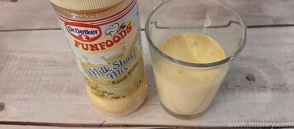funfoods kesar pista milk shake in a glass