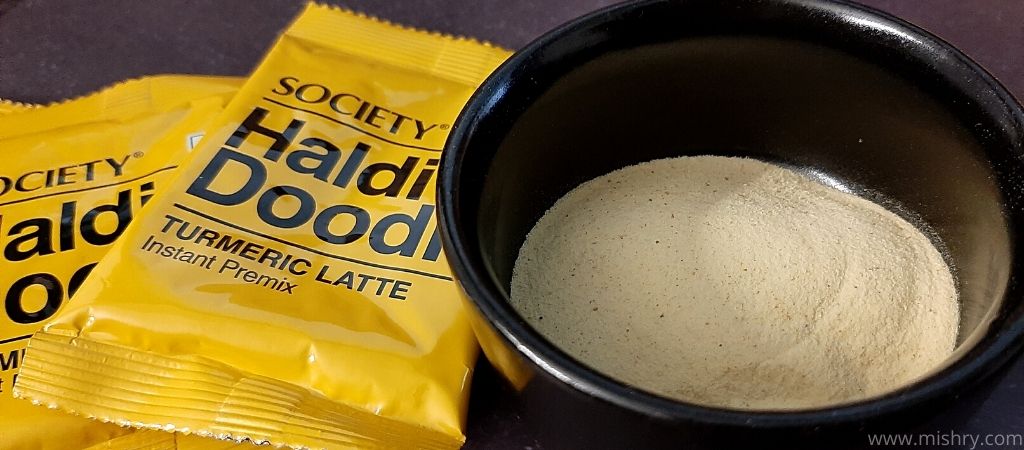 society haldi doodh turmeric latte premix in a bowl