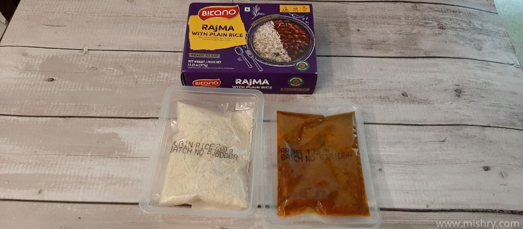 bikano rajma with plain rice packets on a table