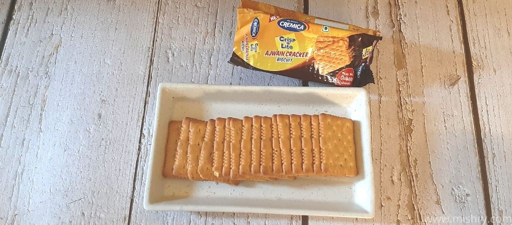 overhead look at cremica ajwain cracker biscuits on a tray