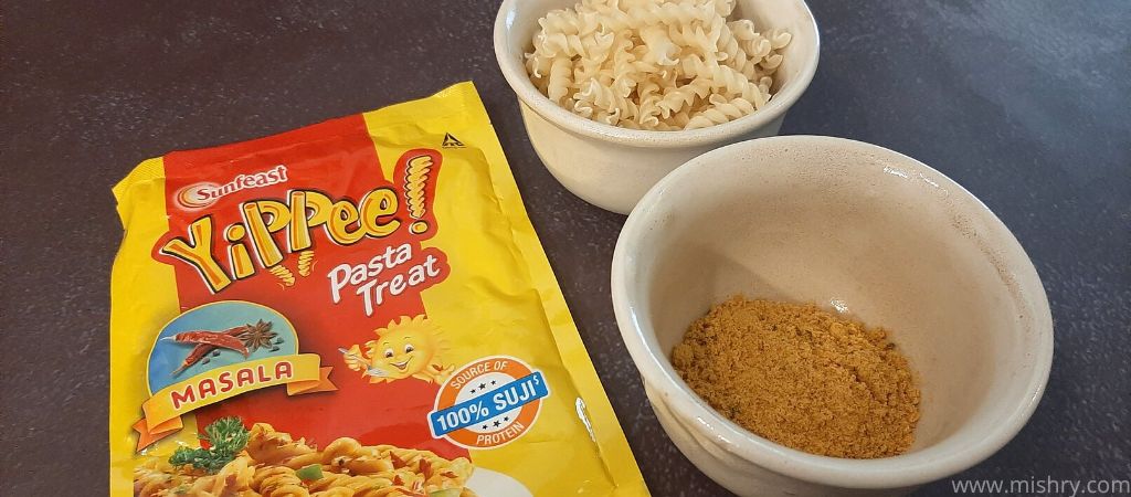 closer look at uncooked masala flavor pasta and seasoning mix