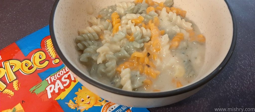 creamy corn pasta in a bowl after cooking