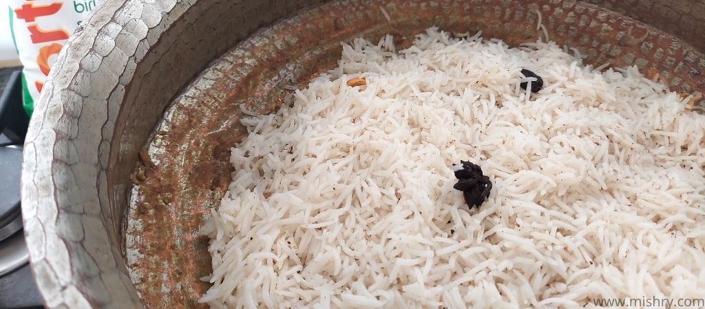layering half cooked fortune biryani special basmati rice