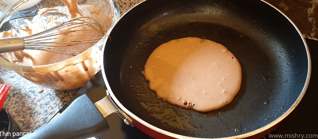 preparing pancake on non stick pan