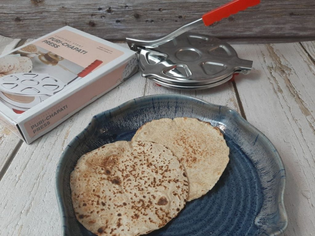 chapatis made in the roti press