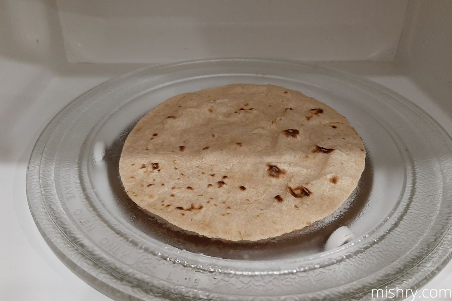 the roti being heated up in the microwave